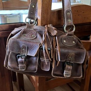 Beautiful Roots leather bag.